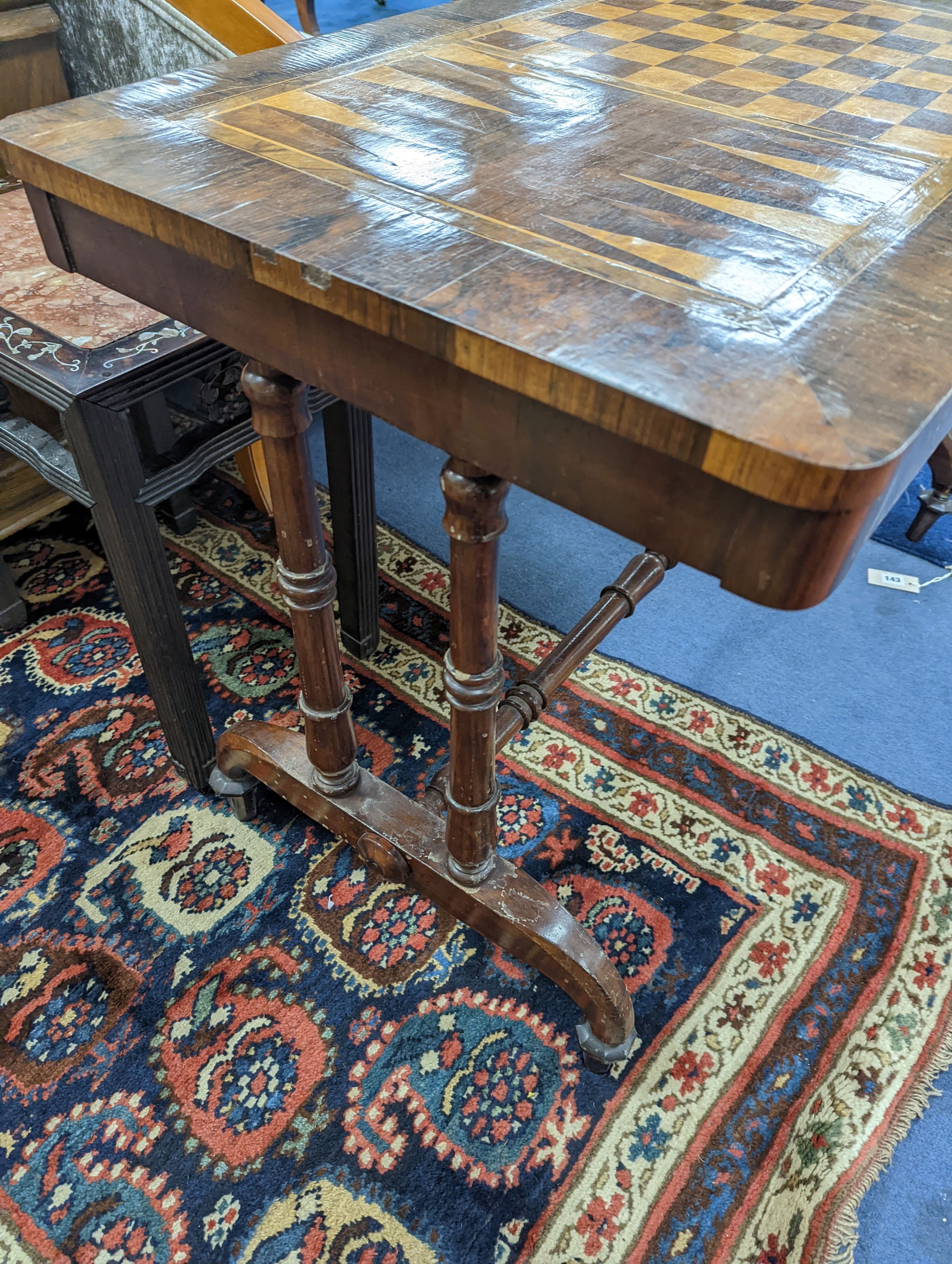 A Victorian rectangular parquetry inlaid rosewood and mahogany games table, width 106cm, depth 53cm, height 71cm